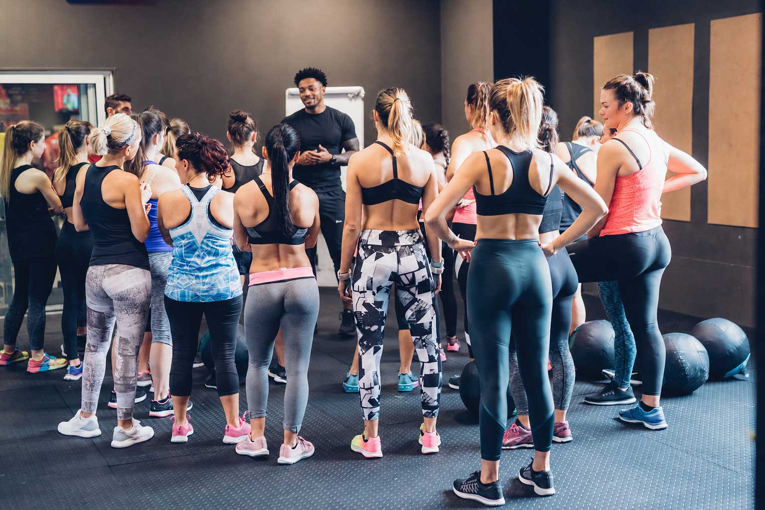 Fitness class in action with an instructor